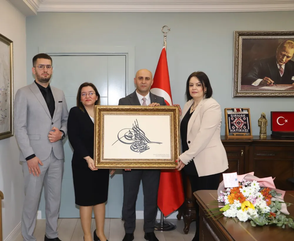 Kaymakam Ekinci, Tapu ve Kadastro Genel Müdürlüğünün 178. kuruluş yıl dönümü nedeniyle Tapu Müdürü Gülşah Yalçın