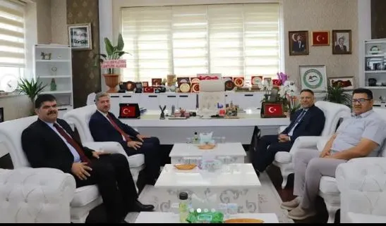 Rektör Prof. Dr. İlhami Gülçin, Iğdır Üniversitesi Rektörlüğüne atanan Prof. Dr. Gürel